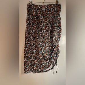 Asymmetrical side tie skirt